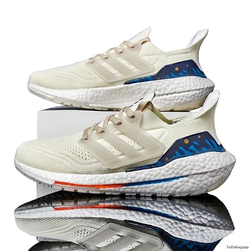 Adidas retro-style white and blue sports shoes