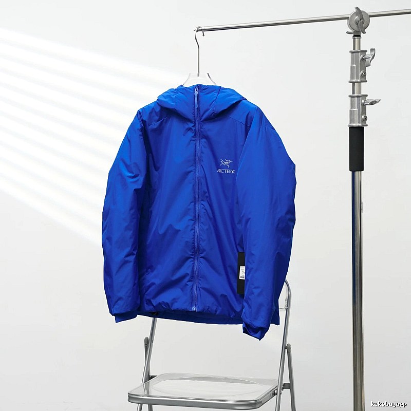 Arc'teryx Royal Blue Lightweight Shell Jacket with vivid hooded finish and compact outdoor profile