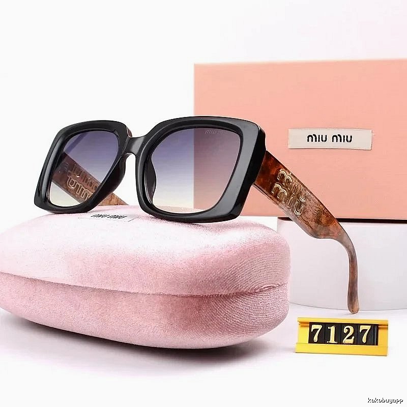 Miu Miu Gift Ready Oversized sunglasses Black Oval Sunglasses with Standout Detail
