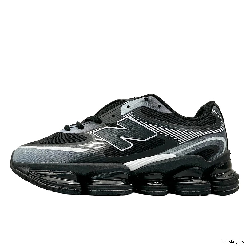 New Balance retro-style black and grey running shoes