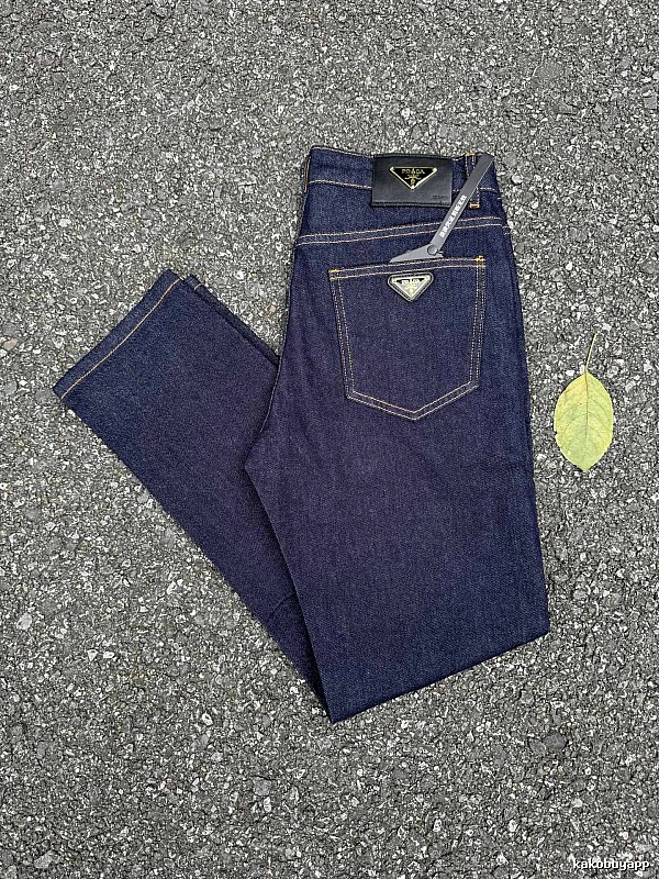 Prada Dark Indigo Logo Jeans with triangle badge hardware and contrast pocket stitching
