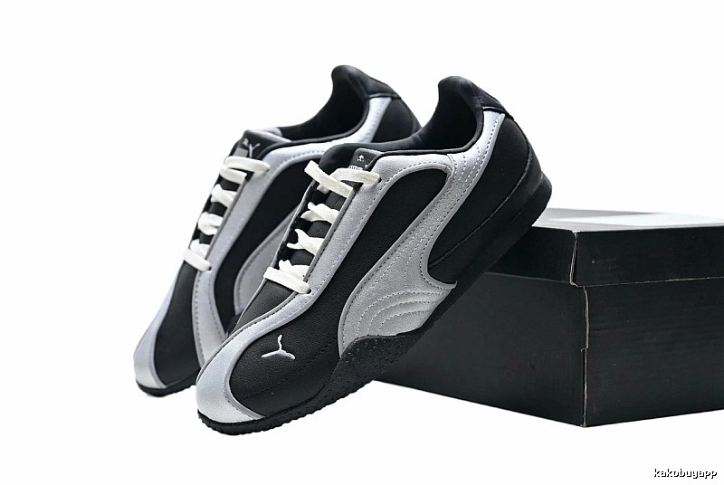 PUMA retro style black and silver sports shoes