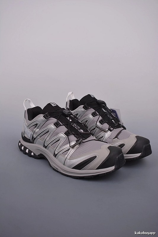 Salomon Gray and Black Trail Runners Highlighting Treaded Trail Sole